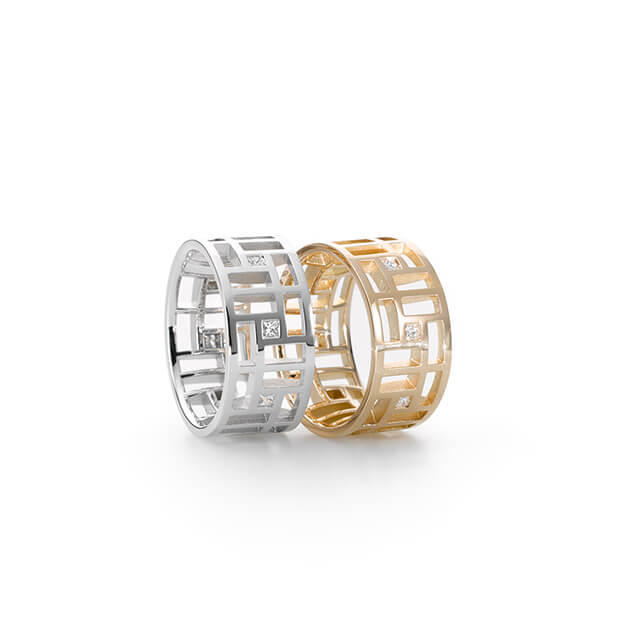 Ringe Einfachheit + Hingabe aus der Kollektion Kumiko. Gearbeitet in Weiß- und Roségold besetzt mit Brillanten. Design Ruth Sellack